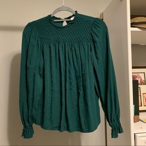 Teal high neck blouse with cinched arms